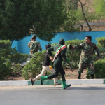 استعراض عسكري تحت النار في ايران، بالصور كيف وقع الهجوم المسلح في الأهواز؟ 16