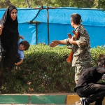 استعراض عسكري تحت النار في ايران، بالصور كيف وقع الهجوم المسلح في الأهواز؟ 40